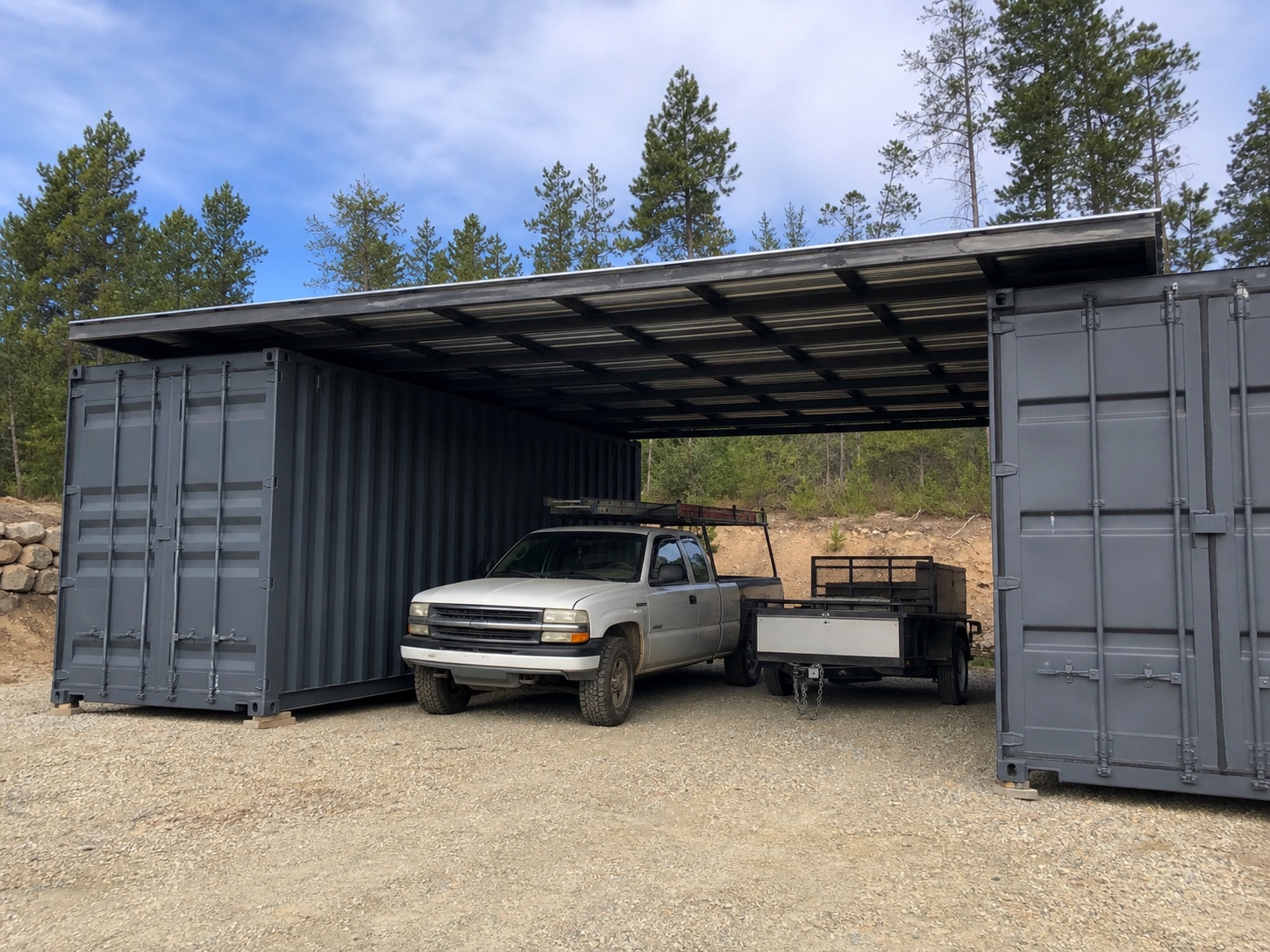 Container-supported carport covering a truck and trailer
