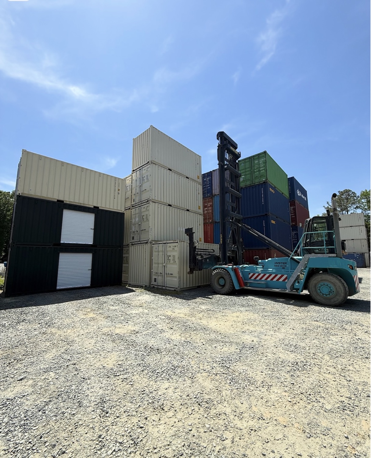 PVG container yard with stacked containers and container-handling equipment