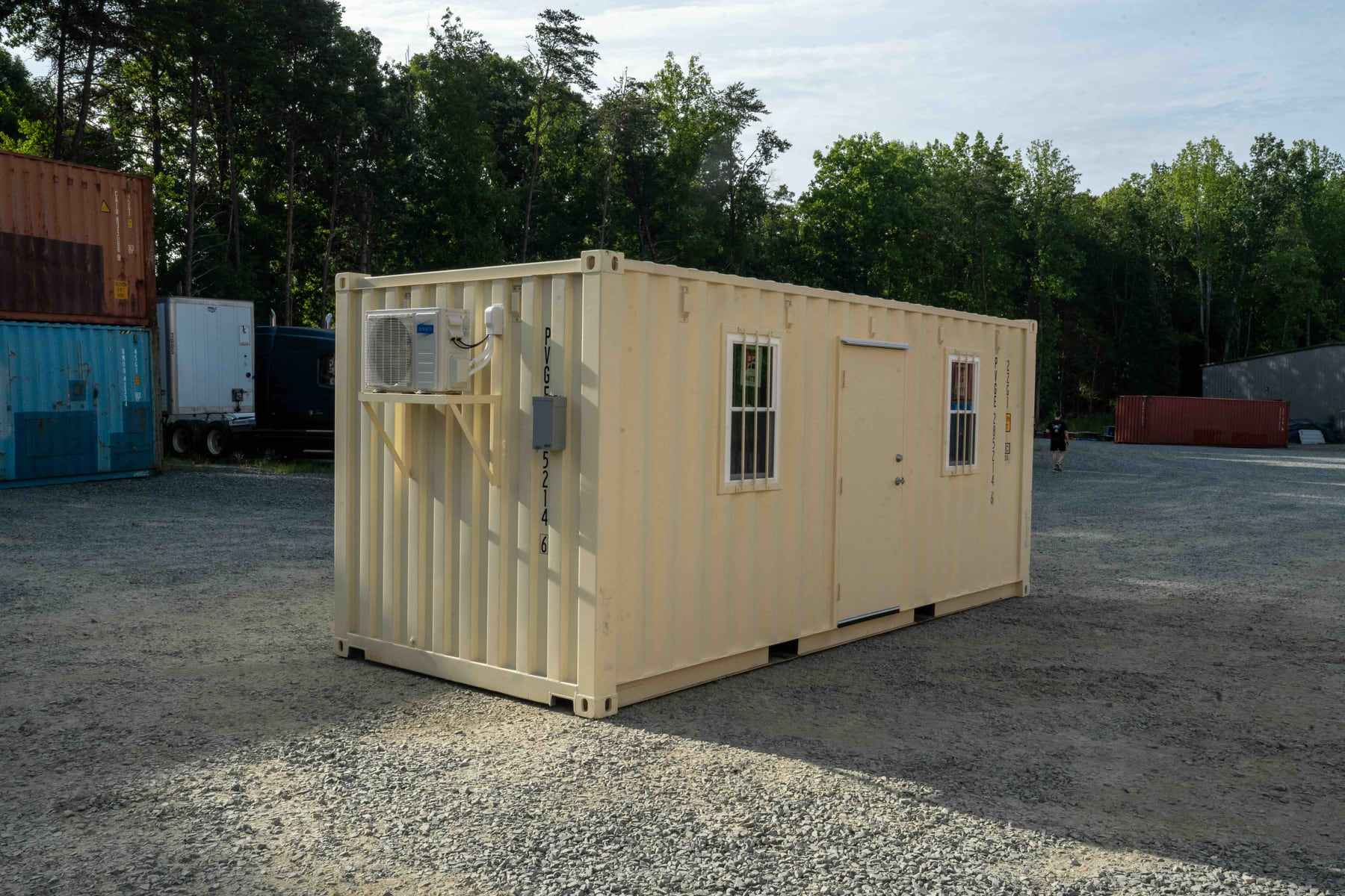 Modified shipping container serving as a mobile construction-site office