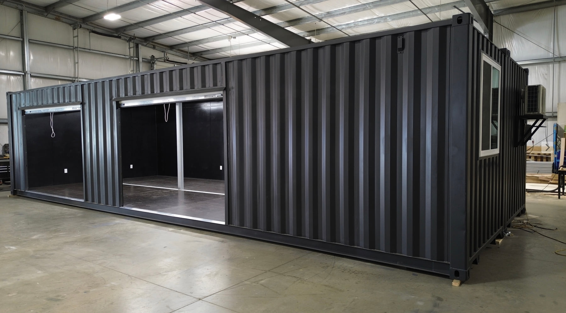 Joined shipping containers configured as a hard-use training space
