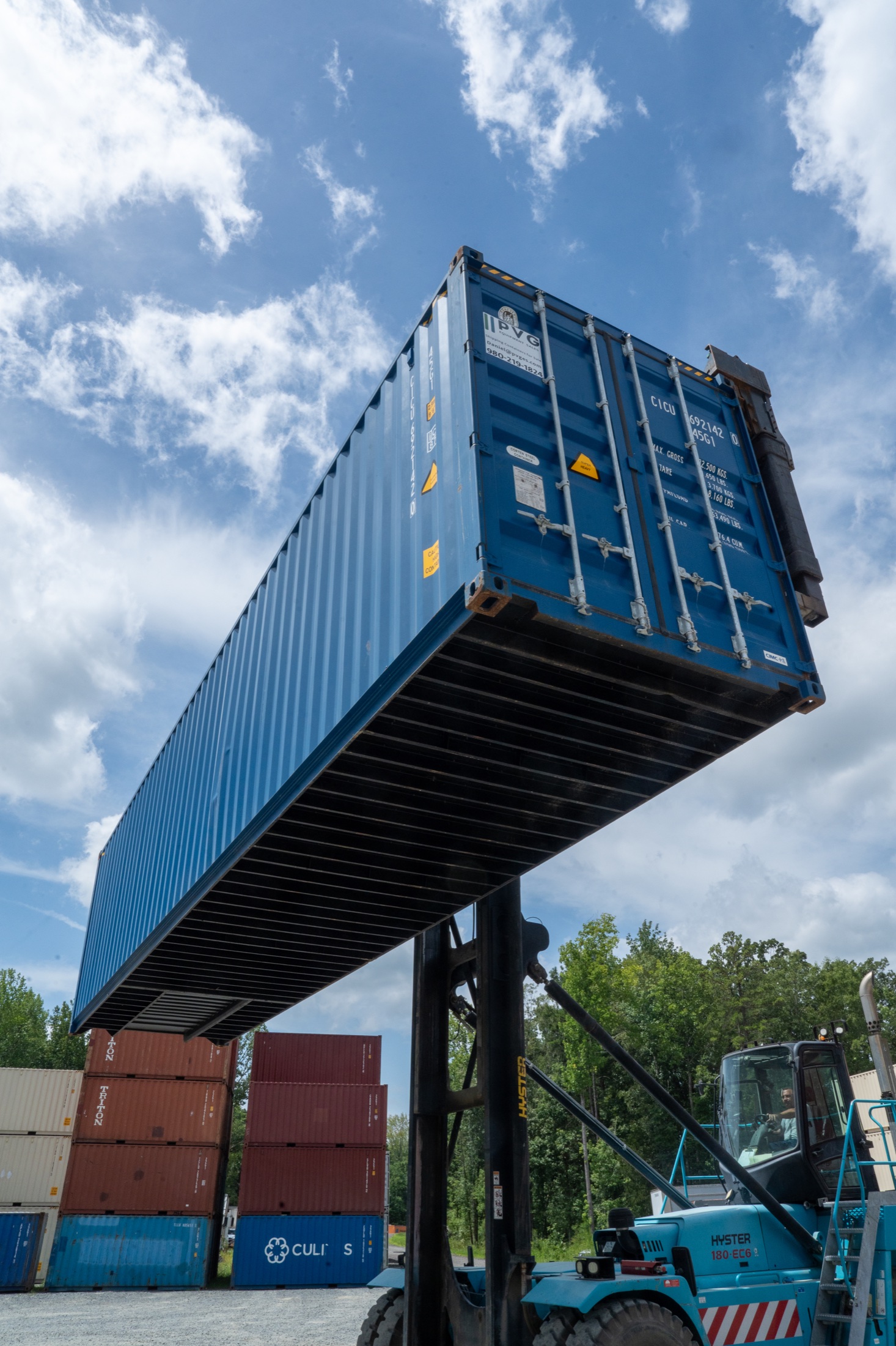 PVG shipping container being handled at the yard