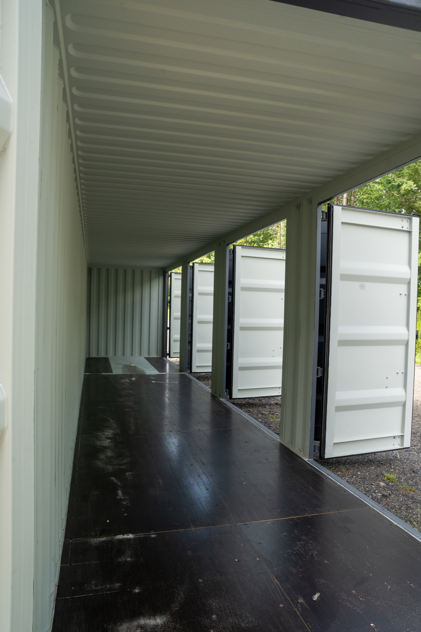 PVG shipping container modified with multiple personnel entry doors.